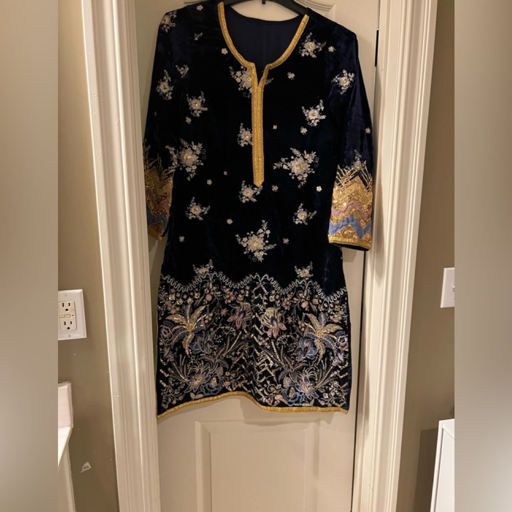 Beautiful embroidered velvet dress with organza duppta and plain trouser..